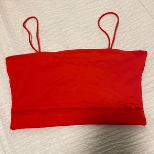 Red crop top with band across bottom with slit Size:S